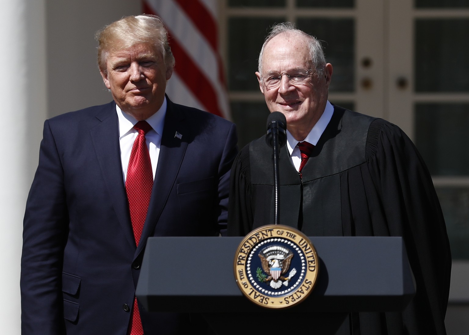 FILE - In this April 10, 2017, file photo, President Donald Trump, left, and Supreme Court Justice Anthony Kennedy participate in a public swearing-in ceremony for Justice Neil Gorsuch in the Rose Gar ...