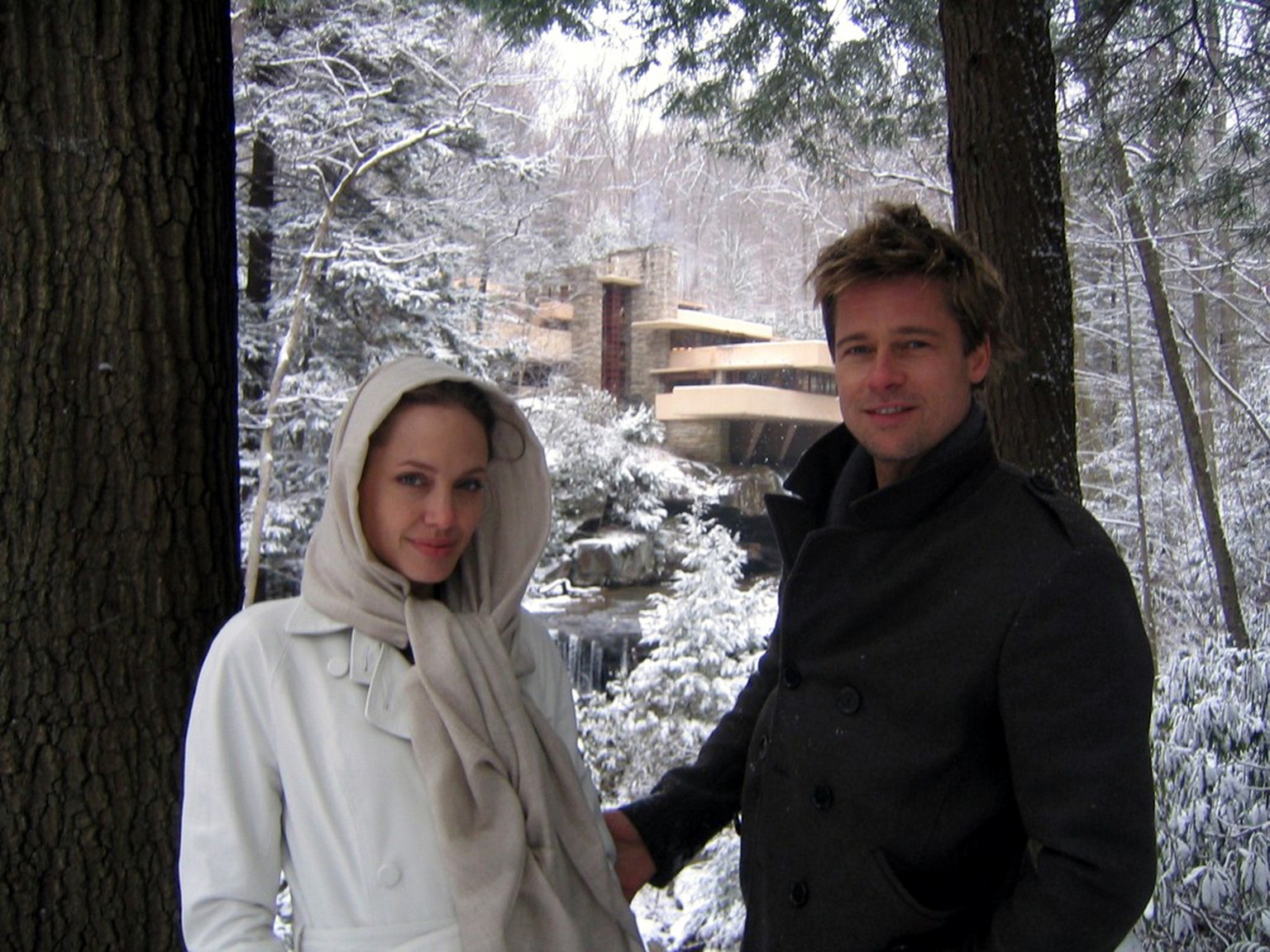 This photo supplied by Western Pennsylvania Conservancy shows Brad Pitt and Angelina Jolie outside Fallingwater in Mill Run, Pa. Thursday, Dec. 7, 2006. The couple visited Frank Lloyd Wright&#039;s ar ...