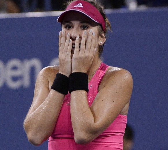 epa04378791 Belinda Bencic of Switzerland reacts after upsetting Jelena Jankovic of Serbia during the seventh day of the 2014 US Open Tennis Championship at the USTA National Tennis Center in Flushing ...
