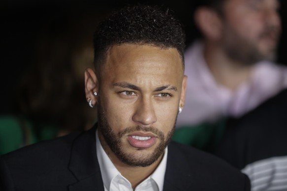 Brazil&#039;s soccer player Neymar speaks to the press as he leaves a police station where he answered questions about rape allegations against him in Sao Paulo, Brazil, Thursday, June 13, 2019. Neyma ...