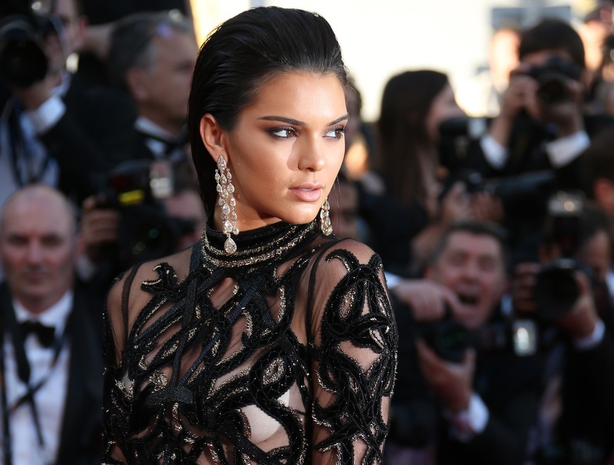 FILE - In this May 15, 2016, file photo, Kendall Jenner poses for photographers upon arrival at the screening of the film Mal De Pierres at the Cannes International Film Festival in southern France. L ...
