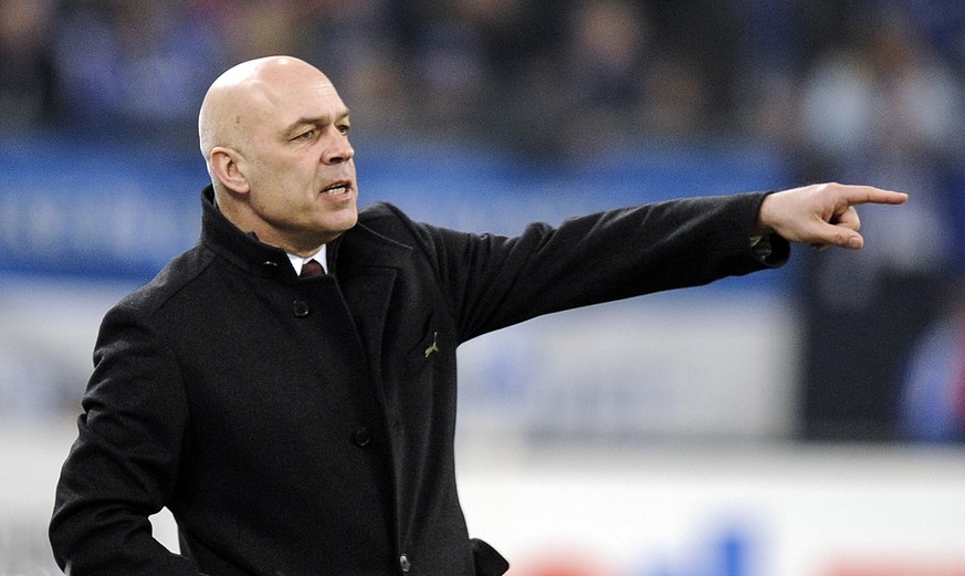 FILE - In this March 12, 2010 file photo, Stuttgart&#039;s head coach Christian Gross reacts during the German first division Bundesliga soccer match between FC Schalke 04 and VfB Stuttgart in Gelsenk ...