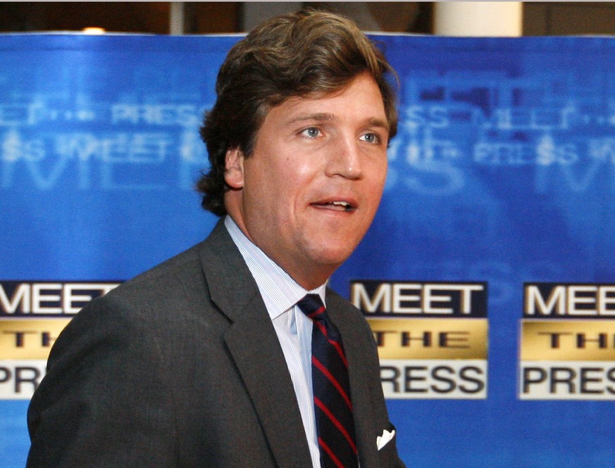 FILE - In this Nov. 17, 2007 file photo, political commentator Tucker Carlson arrives for the 60th anniversary celebration of NBC&#039;s Meet the Press at the Newseum in Washington. Fox News Channel s ...