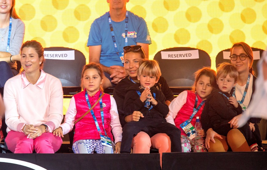 epa06434844 A handout photo made available by Tennis Australia shows Roger Federer (not pictured) of Switzerland&#039;s family; Mirka Federer (L) and two sets of twin children, Myla Rose Federer, Char ...