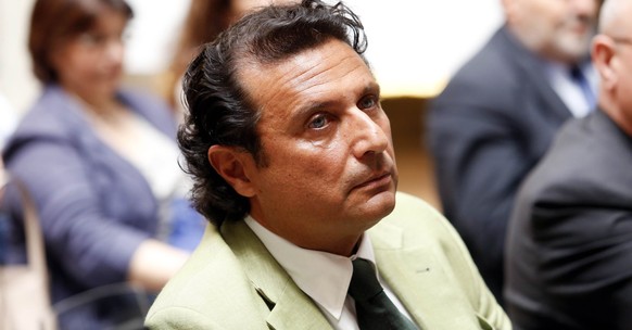 Captain of the capsized Costa Concordia Francesco Schettino attends a meeting in Rome July 10, 2014. The wreck of the Costa Concordia cruise liner is set to be refloated next week, to be towed away fr ...