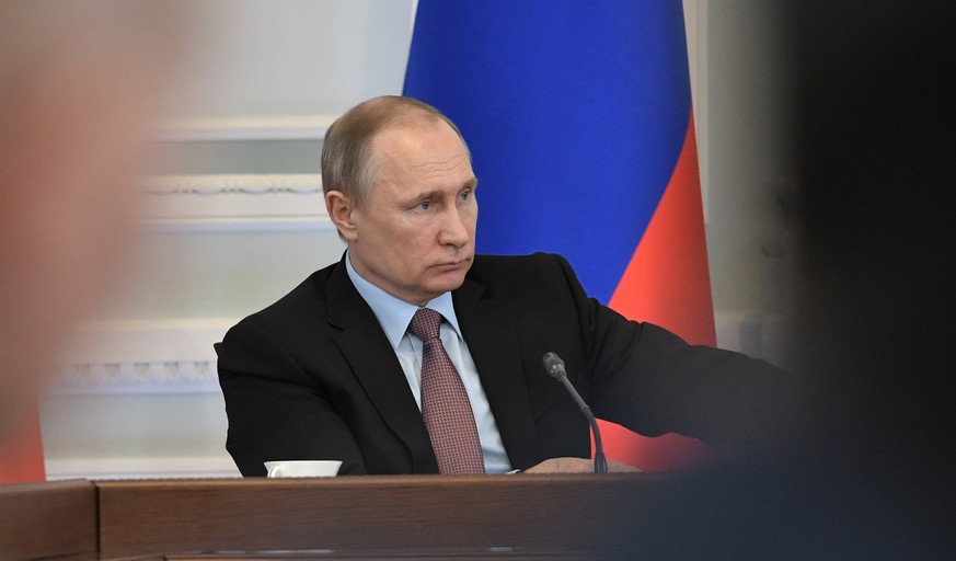 epa05913571 Russian President Vladimir Putin chairs a State Council Presidium meeting on the national consumer rights protection system in Veliky Novgorod (also known as Novgorod the Great or just Nov ...