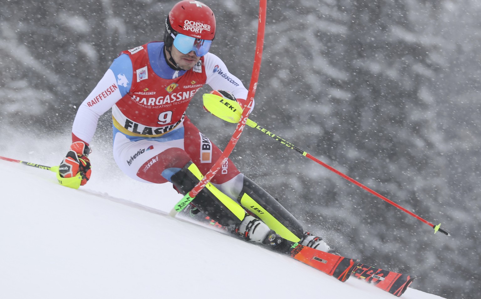 Switzerland&#039;s Loic Meillard speeds down the slope during an alpine ski, men&#039;s World Cup slalom in Flachau, Austria, Sunday, Jan. 17, 2021. (AP Photo/Alessandro Trovati)
