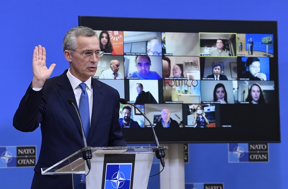 NATO Secretary General Jens Stoltenberg gestures as he addresses a media conference following a virtual meeting of NATO defense ministers at NATO headquarters in Brussels, Wednesday, Feb. 17, 2021. (J ...