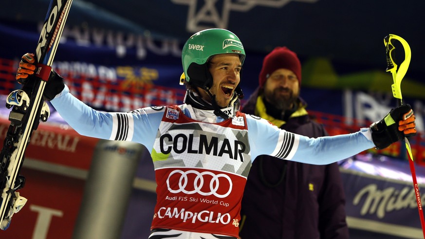 Felix Neureuther, of Germany, celebrates at the finish area after taking the first place of an alpine ski, men&#039;s World Cup slalom in Madonna di Campiglio, Italy, Monday, Dec. 22, 2014. Felix Neur ...