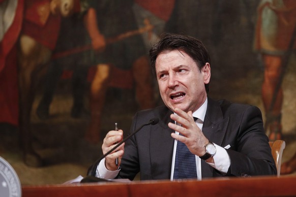 epa08511007 Italian Prime Minister Giuseppe Conte speaks during a press conference held alongside Education Minister Lucia Azzolina (not pictured) at the Chigi Palace in Rome, Italy, 26 June 2020. Con ...