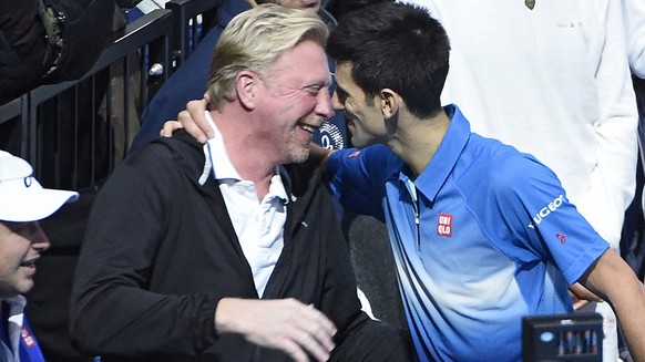 epa05663144 (FILE) A file picture dated 22 November 2015 shows Novak Djokovic of Serbia (R) hugs his coach Boris Becker (L) after winning against Roger Federer of Switzerland during the final at the A ...