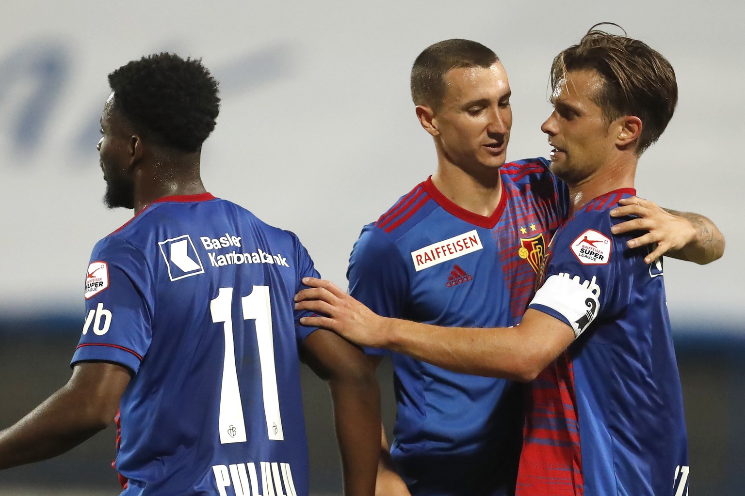 Basel&#039;s Valentin Stocker, right, celebrates with his teammate his goal against Osijek during the Europa League second qualifying round soccer match between Osijek and Basel at the Gradski Vrt sta ...