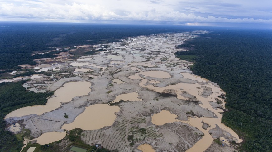 In this Wednesday, Jan. 17, 2018 photo, an area lays deforested by illegal gold mining in the Madre de Dios province of Peru, one day before Pope Francis arrives to Peru&#039;s Amazon. In a letter to  ...