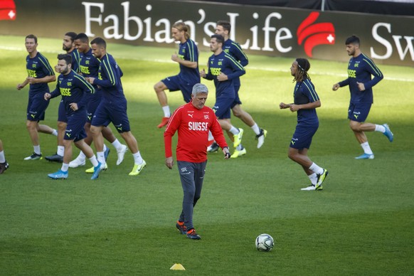 Switzerland&#039;s head coach Vladimir Petkovic walks past his players during a Swiss training session, ahead the UEFA Euro 2020 qualifying Group D soccer match between Switzerland and Republic of Ire ...