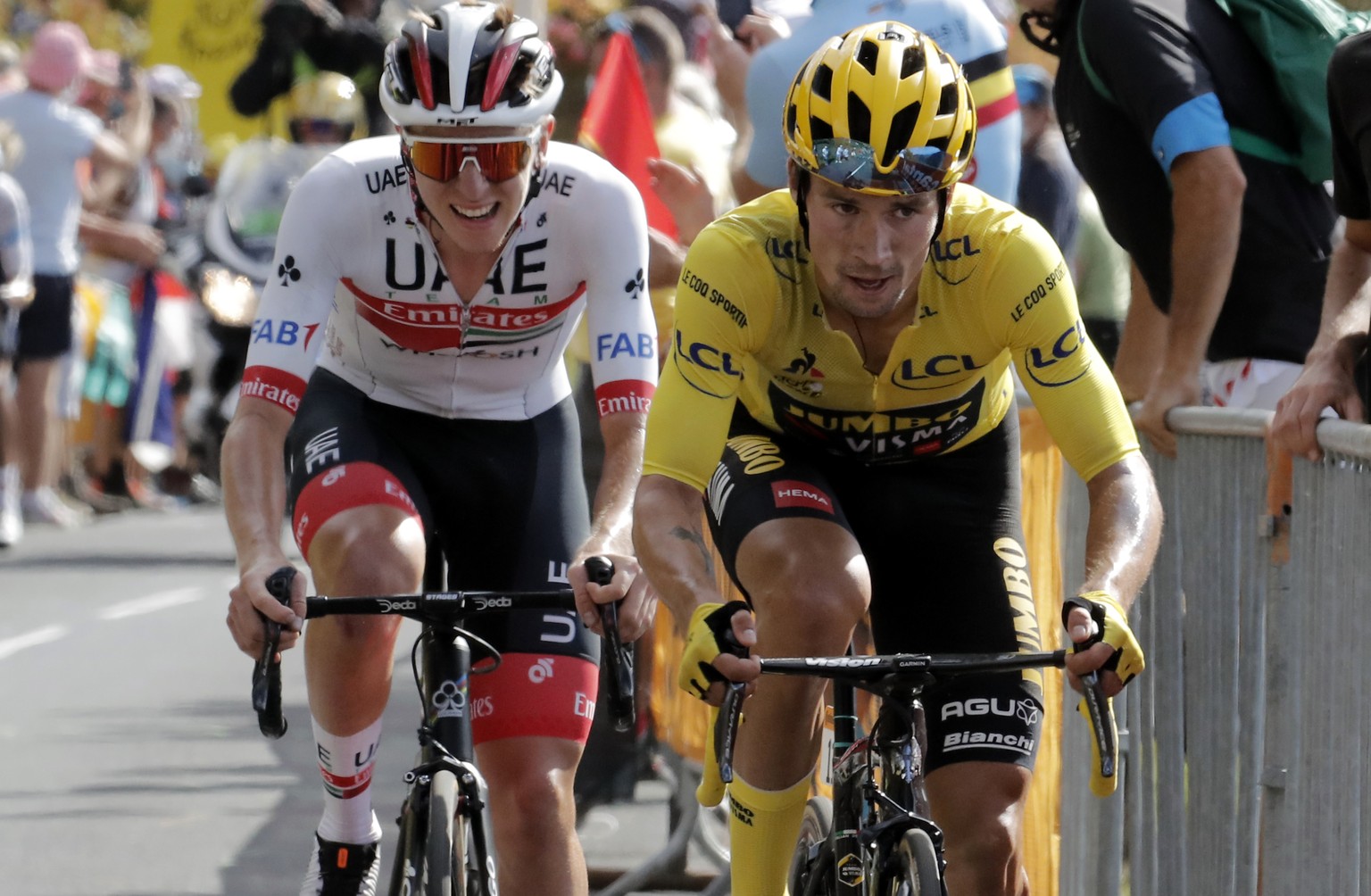 Slovenia&#039;s Primoz Roglic wearing the overall leader&#039;s yellow jersey and Slovenia&#039;s Tadej Pogacar ride during the stage 13 of the Tour de France cycling race over 191 kilometers from Cha ...