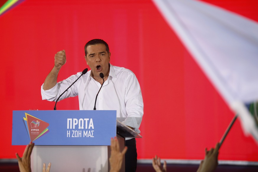 Greek Prime Minister and Syriza party leader Alexis Tsipras addresses supporters during his main election campaign rally in Athens, Friday, July 5, 2019. Greeks head to the polls in early general elec ...