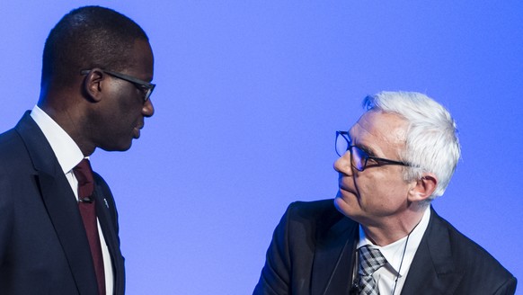 epa08199742 (FILE) Tidjane Thiam, left, CEO Credit Suisse, and Urs Rohner, right, chairman Credit Suisse, after an extraordinary general assembly in Bern, Switzerland, 19 November 2015 (reissued 07 Fe ...