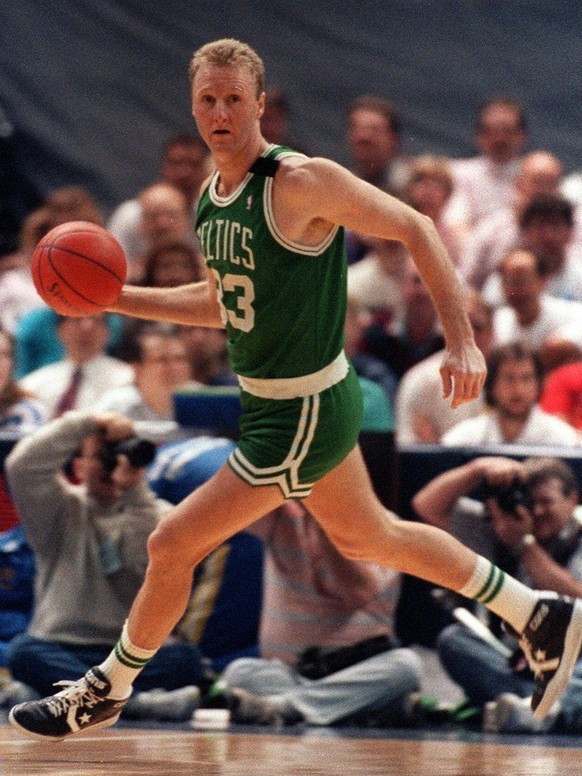 FILE -- Boston Celtics&#039; Larry Bird brings the ball up the court against the Indiana Pacers in Indianapolis, in this March 27, 1990 photo. Bird, whose talent and tenacity led the Boston Celtics to ...