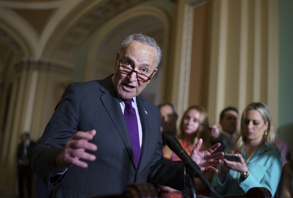 Senate Majority Leader Chuck Schumer, D-N.Y., and the Democratic leadership speak to reporters about progress on an infrastructure bill and voting rights legislation, at the Capitol in Washington, Tue ...