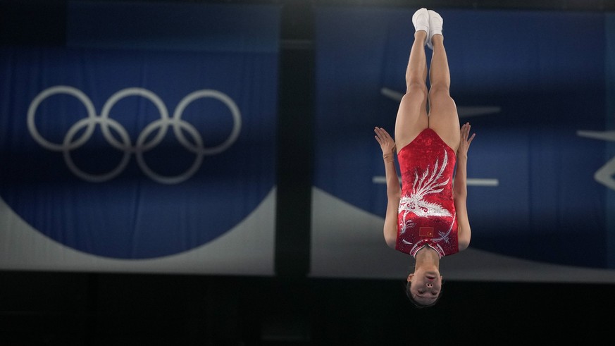 Xueying Zhu, of China, performs in a women&#039;s trampoline gymnastics qualifier at the 2020 Summer Olympics, Friday, July 30, 2021, in Tokyo. (AP Photo/Natacha Pisarenko)
