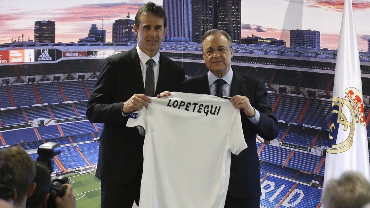President of Real Madrid, Florentino Perez , centre right and newly appointed Real Madrid coach Julen Lopetegui pose for a photo, during a press conference in Madrid, Thursday, June 14, 2018. Lopetegu ...