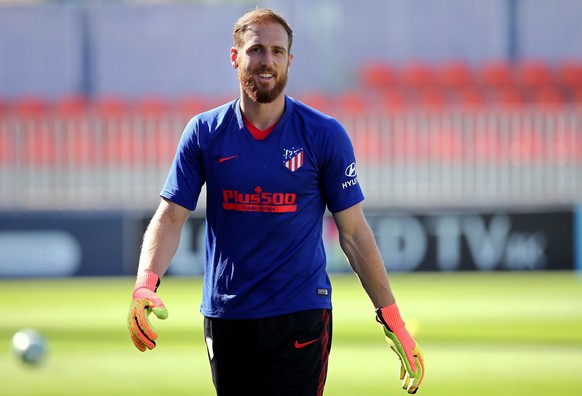 epa08547294 A handout photo made available by Atletico Madrid shows Atletico&#039;s Jan Oblak during the team&#039;s training session at Wanda Sports city in Majadahonda, Madrid, Spain, 15 July 2020.  ...