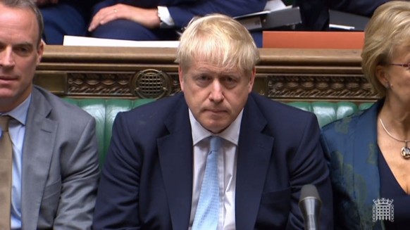 epa07891425 A grab from a handout video made available by the UK Parliamentary Recording Unit shows British Prime Minister Boris Johnson during a session at the House of Commons in London, Britain, 03 ...