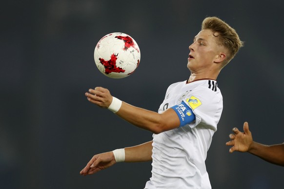 FILE - In this Oct. 16, 2017 file photo Germany&#039;s Jann Fiete Arp controls the ball during the FIFA U-17 World Cup against Colombia in New Delhi, India. Hamburger SV is relying heavily on the 17-y ...