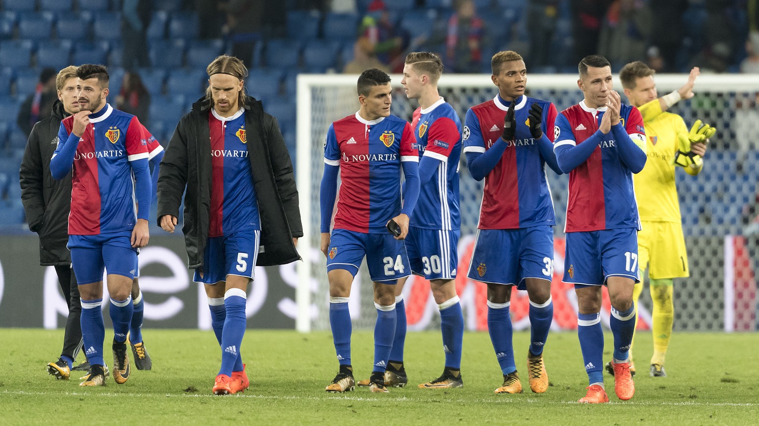Basel&#039;s disappointed players thank the fans after the UEFA Champions League Group stage Group A matchday 4 soccer match between Switzerland&#039;s FC Basel 1893 and Russia&#039;s CSKA Moskva in t ...