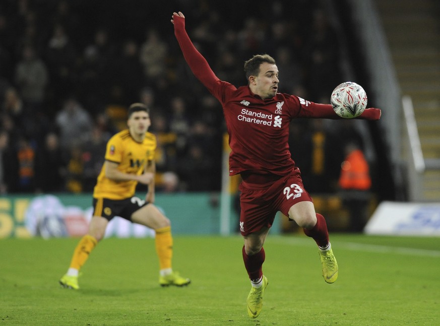 Liverpool&#039;s Xherdan Shaqiri controls the ball during the English FA Cup third round soccer match between Wolverhampton Wanderers and Liverpool at the Molineux Stadium in Wolverhampton, England, M ...