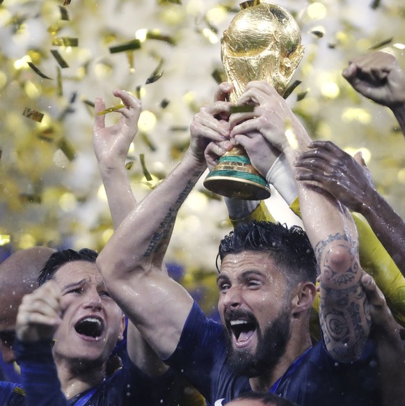 France&#039;s Olivier Giroud olds the trophy after the final match between France and Croatia at the 2018 soccer World Cup in the Luzhniki Stadium in Moscow, Russia, Sunday, July 15, 2018. (AP Photo/N ...