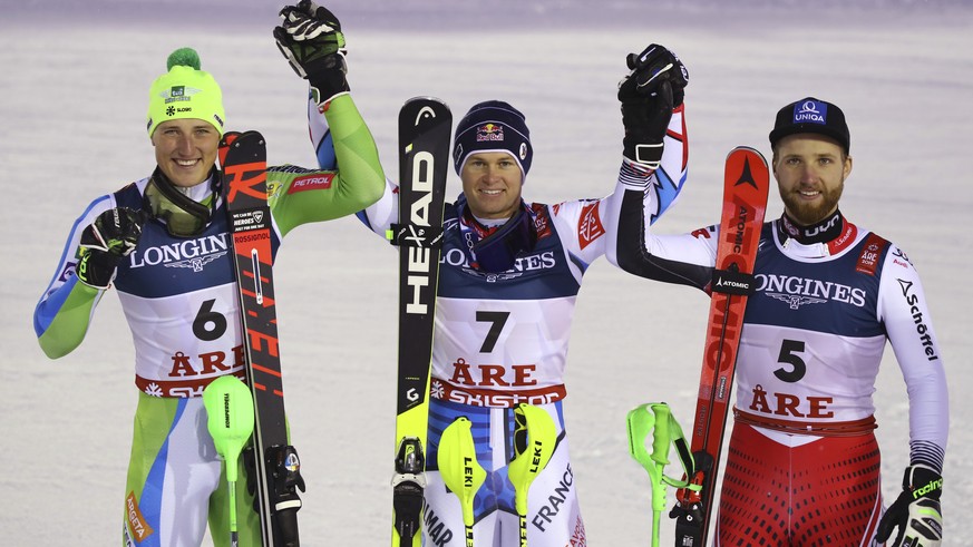 From left, runner-up Slovenia&#039;s Stefan Hadalin, the winner France&#039;s Alexis Pinturault and third placed Austria&#039;s Marco Schwarz pose in the finish area after the slalom portion of the me ...
