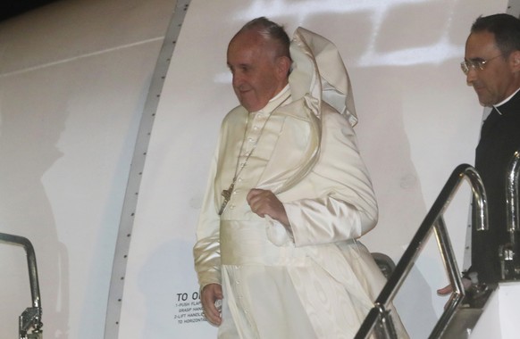 Pope Francis disembarks from his plane upon arrival at Haneda international airport in Tokyo Saturday, Nov. 23, 2019. Pope Francis arrived in Japan for a three-day visit. (AP Photo/Koji Sasahara)