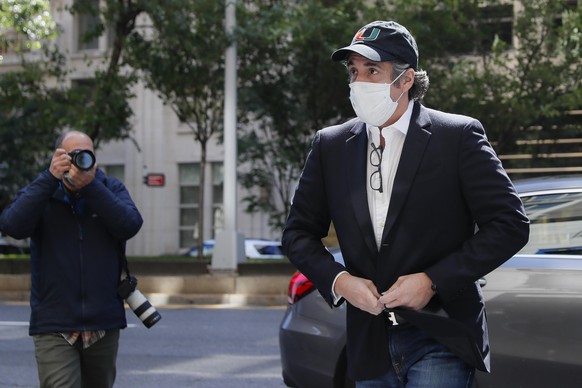 Michael Cohen arrives at his Manhattan apartment, Thursday, May 21, 2020, in New York. President Donald Trump&#039;s longtime personal lawyer and fixer was released federal prison Thursday and is expe ...