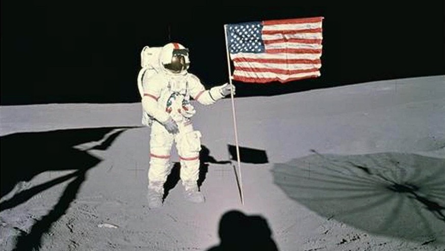 FILE--Astronaut Alan B. Shepard stands with the American Flag on Lunar Surface in this Jan. 13, 1971 file photo. Shepard, the first American to fly in space and the fifth human to walk on the moon, di ...