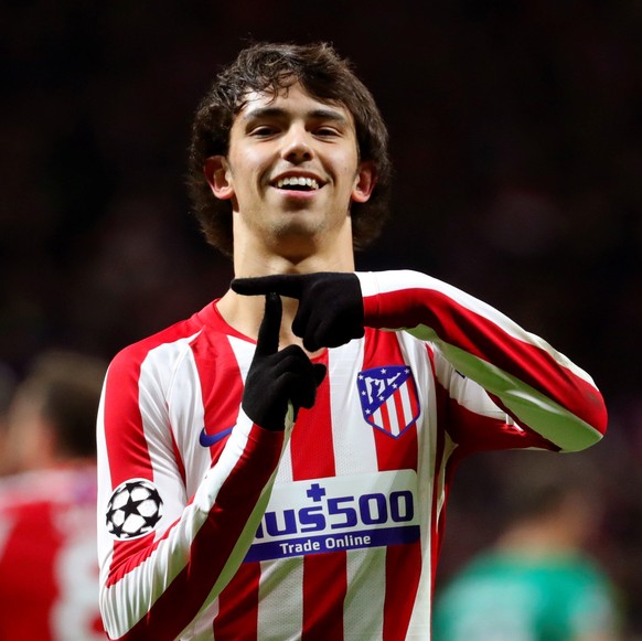 epa08063535 Atletico Madrid&#039;s Joao Felix celebrates after converting a penalty during the UEFA Champions League group stage soccer match between Atletico Madrid and FC Lokomotiv Moscow at the Wan ...