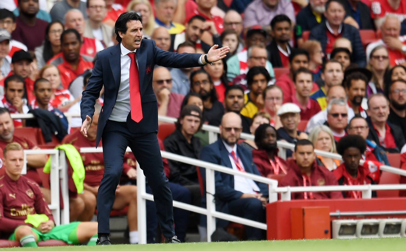 epa06946023 Arsenal manager Unai Emery reacts during the English Premier League soccer match between Arsenal FC and Manchester City at the Emirates Stadium in London, Britain, 12 August 2018. EPA/ANDY ...