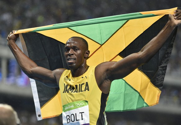 epa06022068 (FILE) - Usain Bolt of Jamaica celebrates after winning the gold medal in the men&#039;s 200m Final race of the Rio 2016 Olympic Games Athletics, Track and Field events at the Olympic Stad ...
