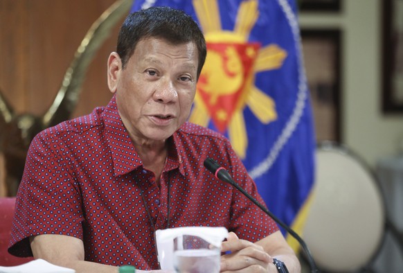 FILE - In this May 28, 2020, file photo provided by the Malacanang Presidential Photographers Division, Philippine President Rodrigo Duterte, talks during his speech at the Malacanang presidential pal ...