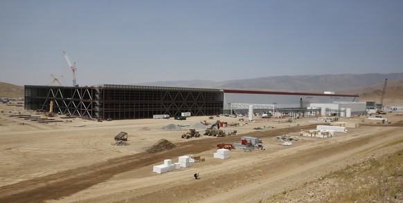 Construction continues on the new Tesla Gigafactory during a media tour Tuesday, July 26, 2016, in Sparks, Nev. It’s Tesla Motors’ biggest bet yet: A massive, $5 billion factory in the Nevada desert t ...