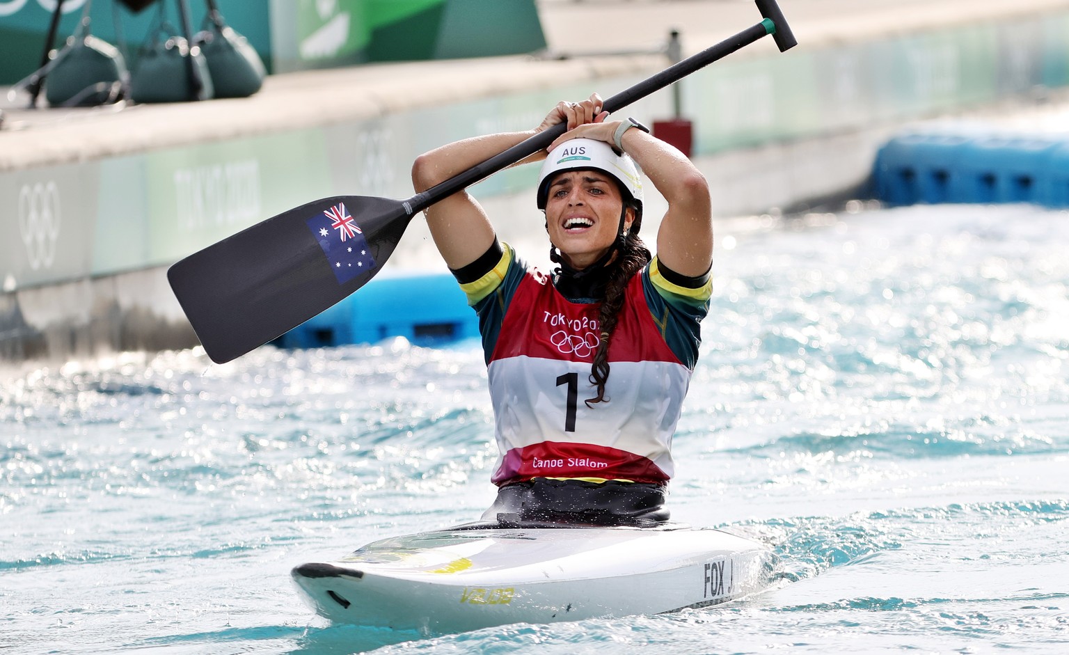epa09375848 Jessica Fox of Australia celebrates after her run in the Women&#039;s Canoe Slalom Final at the Canoeing Slalom events of the Tokyo 2020 Olympic Games at the Kasai Rinkai Park in Tokyo, Ja ...