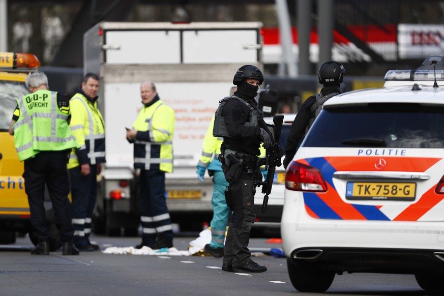 epa07446481 Emergency services at the 24 Oktoberplace where a shooting took place in Utrecht, The Netherlands, 18 March 2019. According to the the Dutch Police, several people have been injured in a s ...