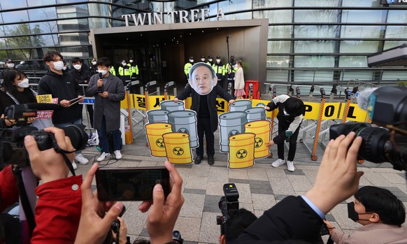 epa09131828 South Korean civic activists stage a protest against the Japanese government&#039;s decision to discharge radioactive water from the crippled Fukushima nuclear plant into the Pacific Ocean ...