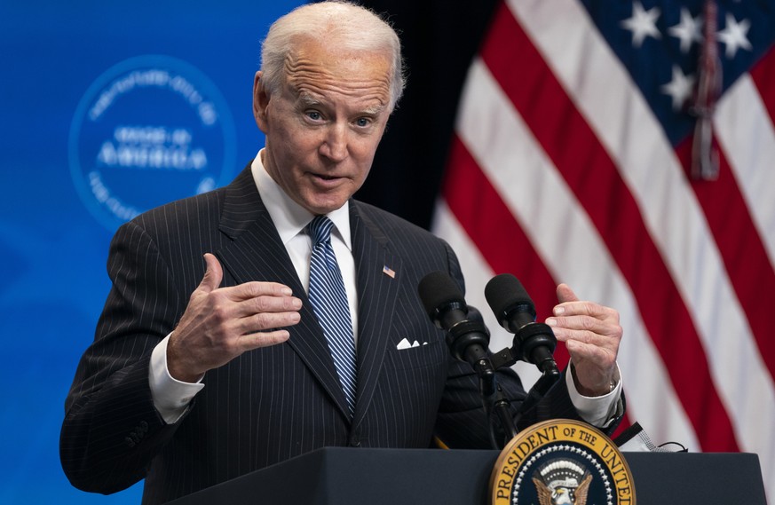 FILE - In this Jan. 25, 2021, file photo, President Joe Biden answers questions from reporters in the South Court Auditorium on the White House complex, in Washington. Biden is unlikely to confront Ch ...