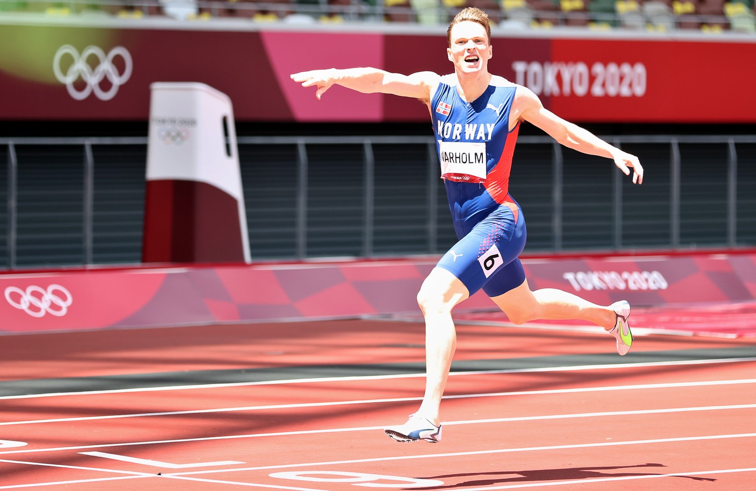 epa09389377 Karsten Warholm of Norway winning the Men&#039;s 400m Hurdles final at the Athletics events of the Tokyo 2020 Olympic Games at the Olympic Stadium in Tokyo, Japan, 03 August 2021. EPA/DIEG ...
