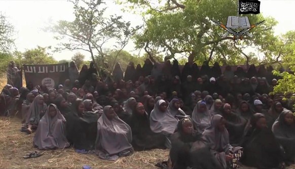 FILE - This Monday May 12, 2014 file image taken from video by Nigeria&#039;s Boko Haram terrorist network, shows the alleged missing girls abducted from the northeastern town of Chibok. Islamic extre ...