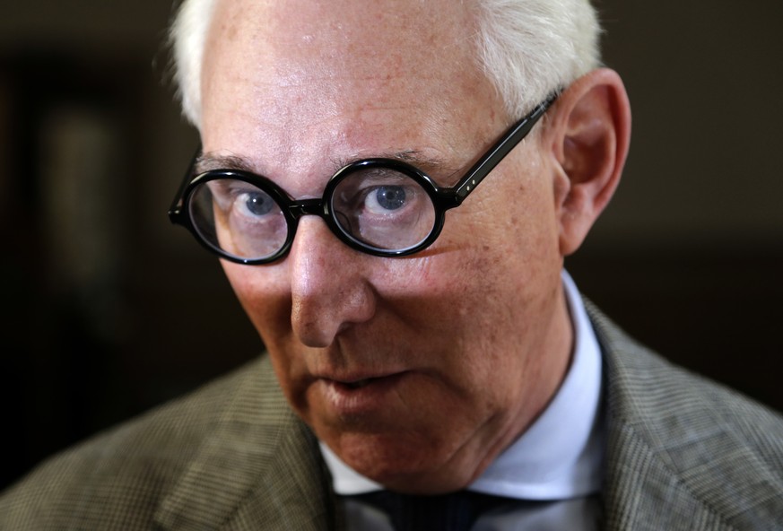 Roger Stone talks to reporters outside a courtroom in New York, Thursday, March 30, 2017. Stone, a longtime political provocateur and adviser to President Donald Trump, is being sued over a flyer sent ...