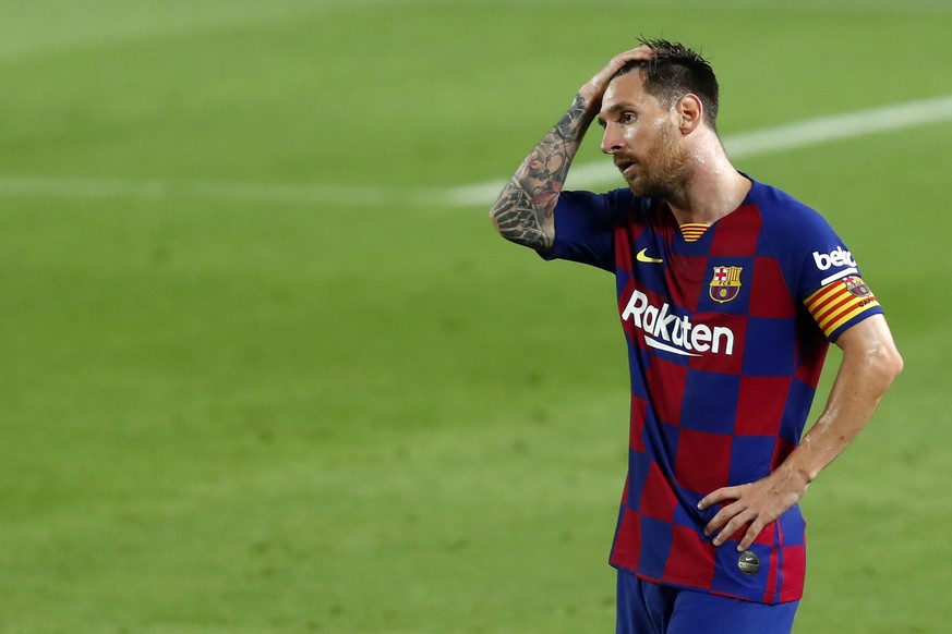 Barcelona&#039;s Lionel Messi reacts after the end of a Spanish La Liga soccer match between Barcelona and Osasuna at the Camp Nou stadium in Barcelona, Spain, Thursday, July 16, 2020. (AP Photo/Joan  ...