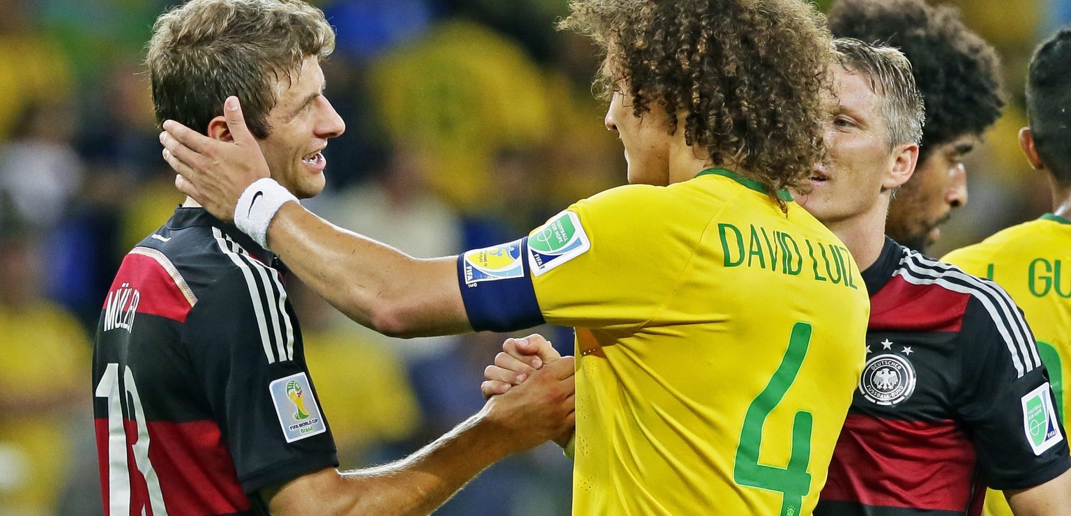 Hauptdarsteller in einem verrückten Spiel: Deutschlands Torschütze Thomas Müller, Brasiliens Verteidiger David Luiz.