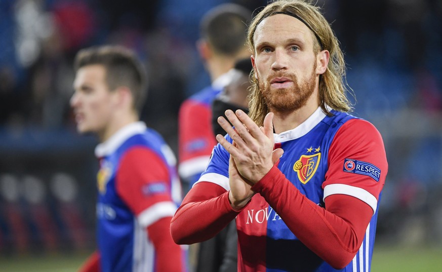 epa06522497 Basel&#039;s Michael Lang reacts after the UEFA Champions League round of 16 first leg soccer match between FC Basel and Manchester City in the St. Jakob-Park stadium in Basel, Switzerland ...